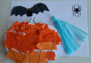 Prezentacja prac dzieci wykonanych przy użyciu czarnego kartonu - kot, pomarańczowej bibuły - dynia, białej bibuły – duszek, czarnej bibuły – nietoperz, czarnego kartonu – pająki, zielonej kartki - listki.